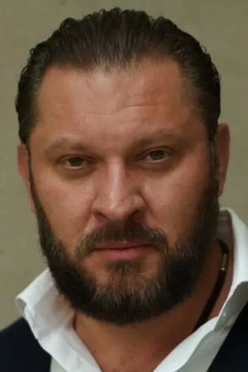 Марк Бартон